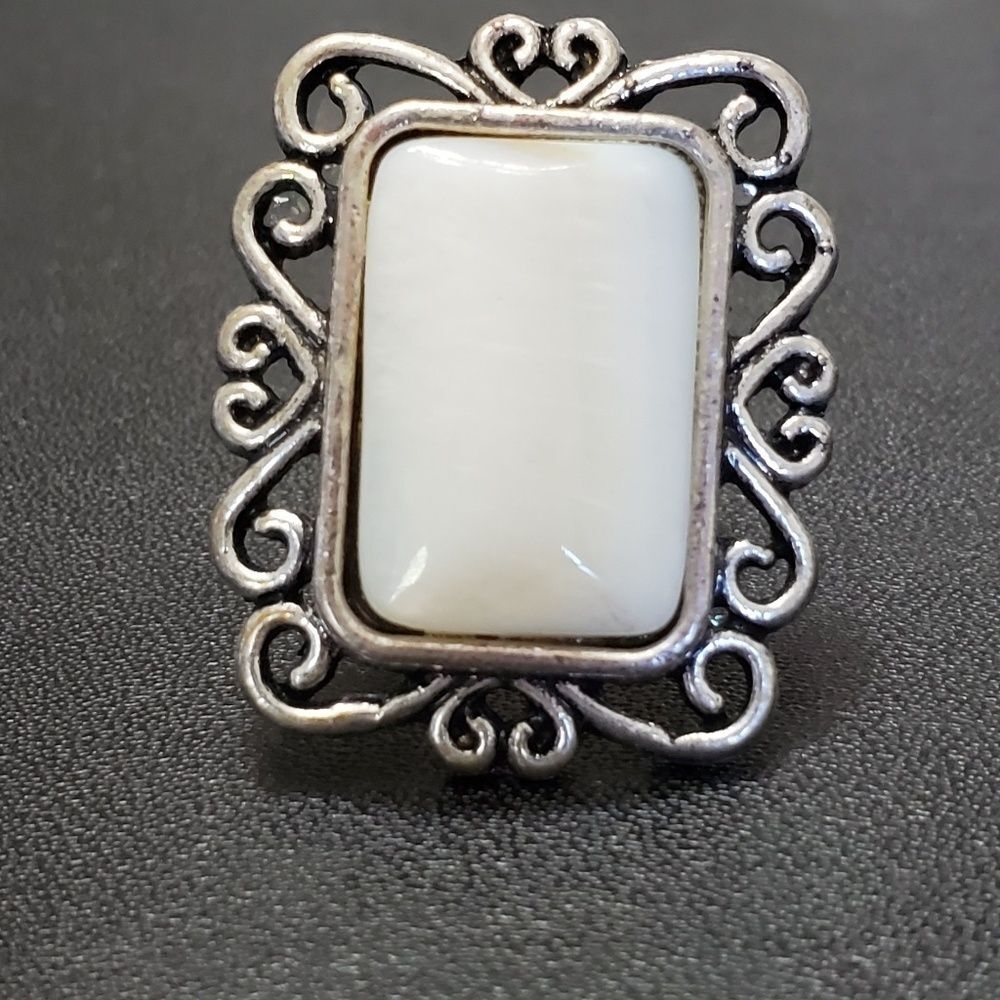 Silver tone rectangular white stone ring